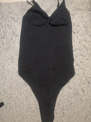 Body - Body från H&M i storlek M men passar S 