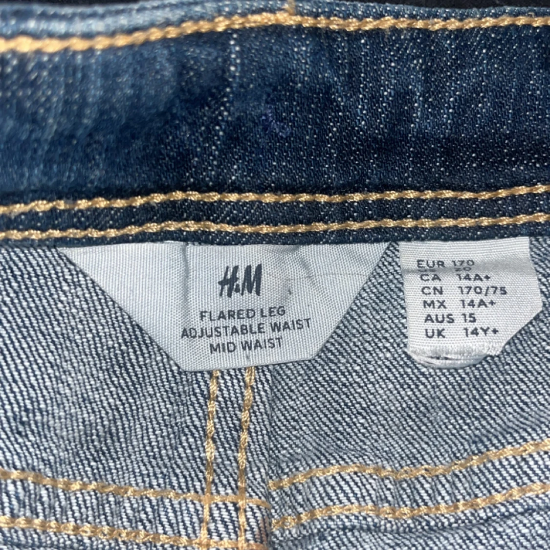 Blå flared jeans från H&M, mid waist - 1