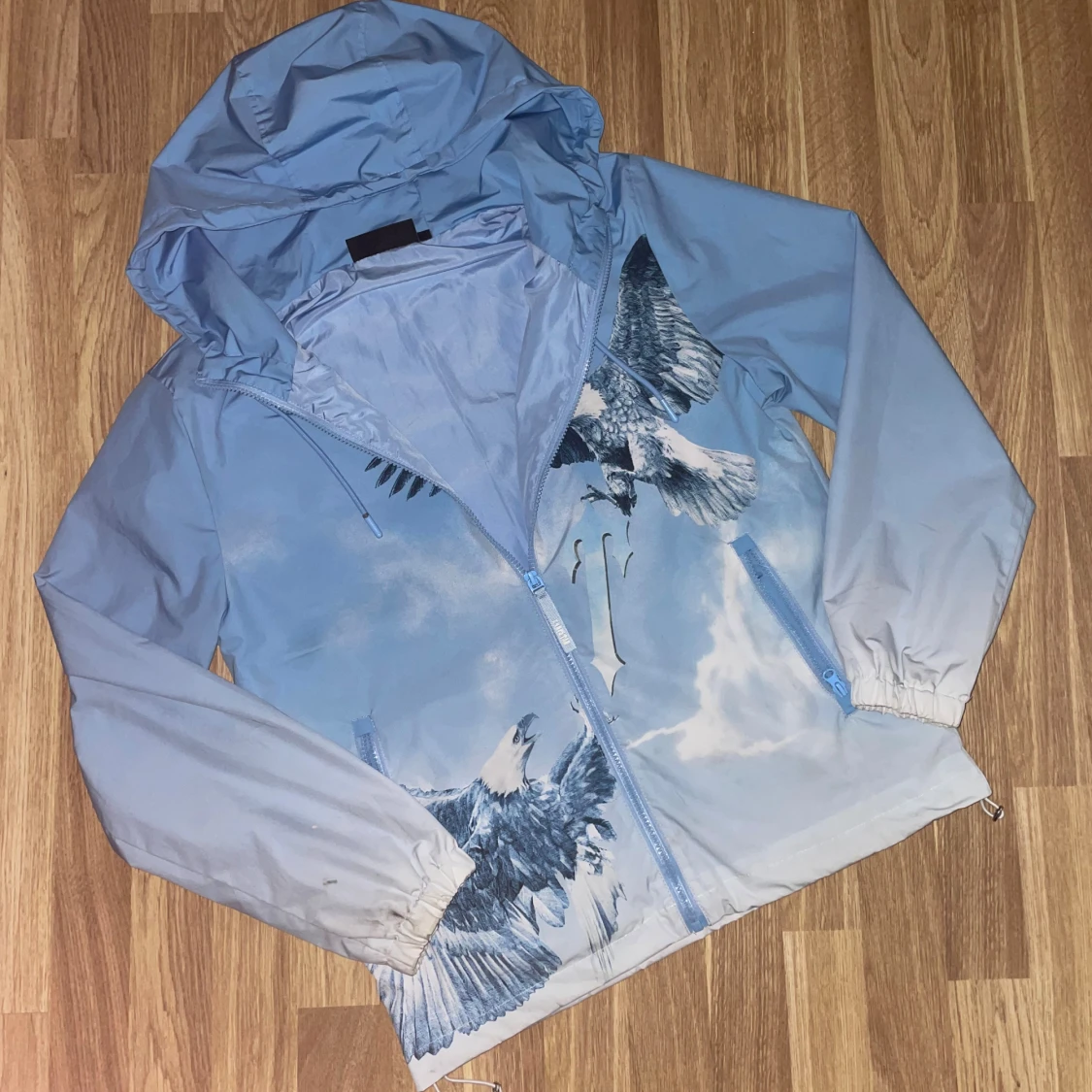 Ljusblå trapstar windbreaker