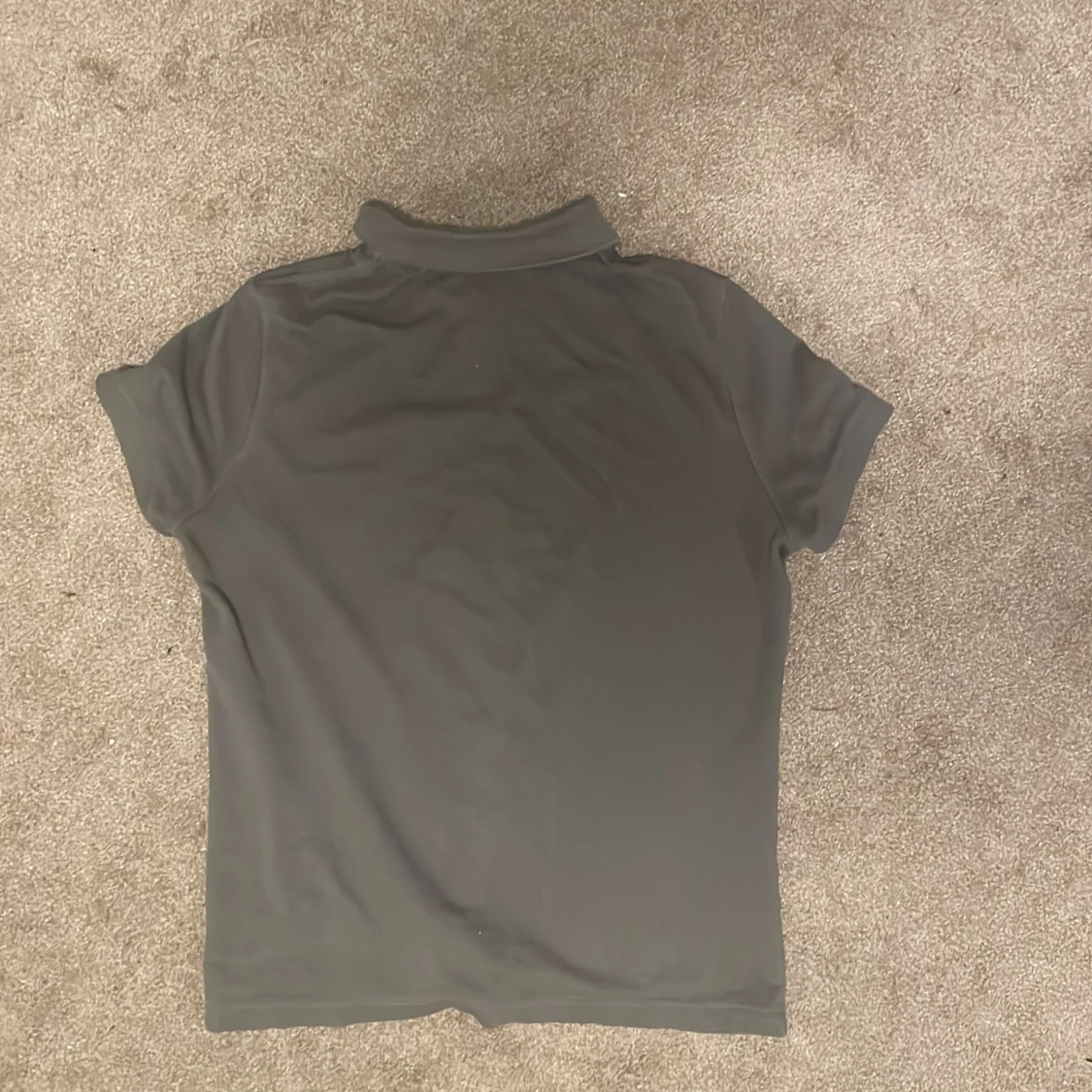 Mörkgrön pikétröja från Lacoste - 1