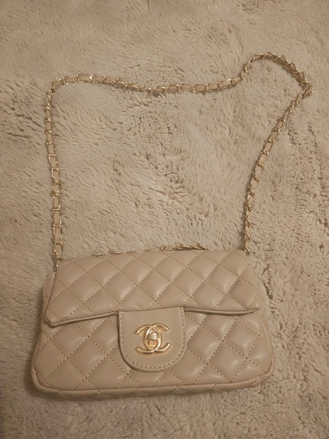 Beige quiltadl axelväska