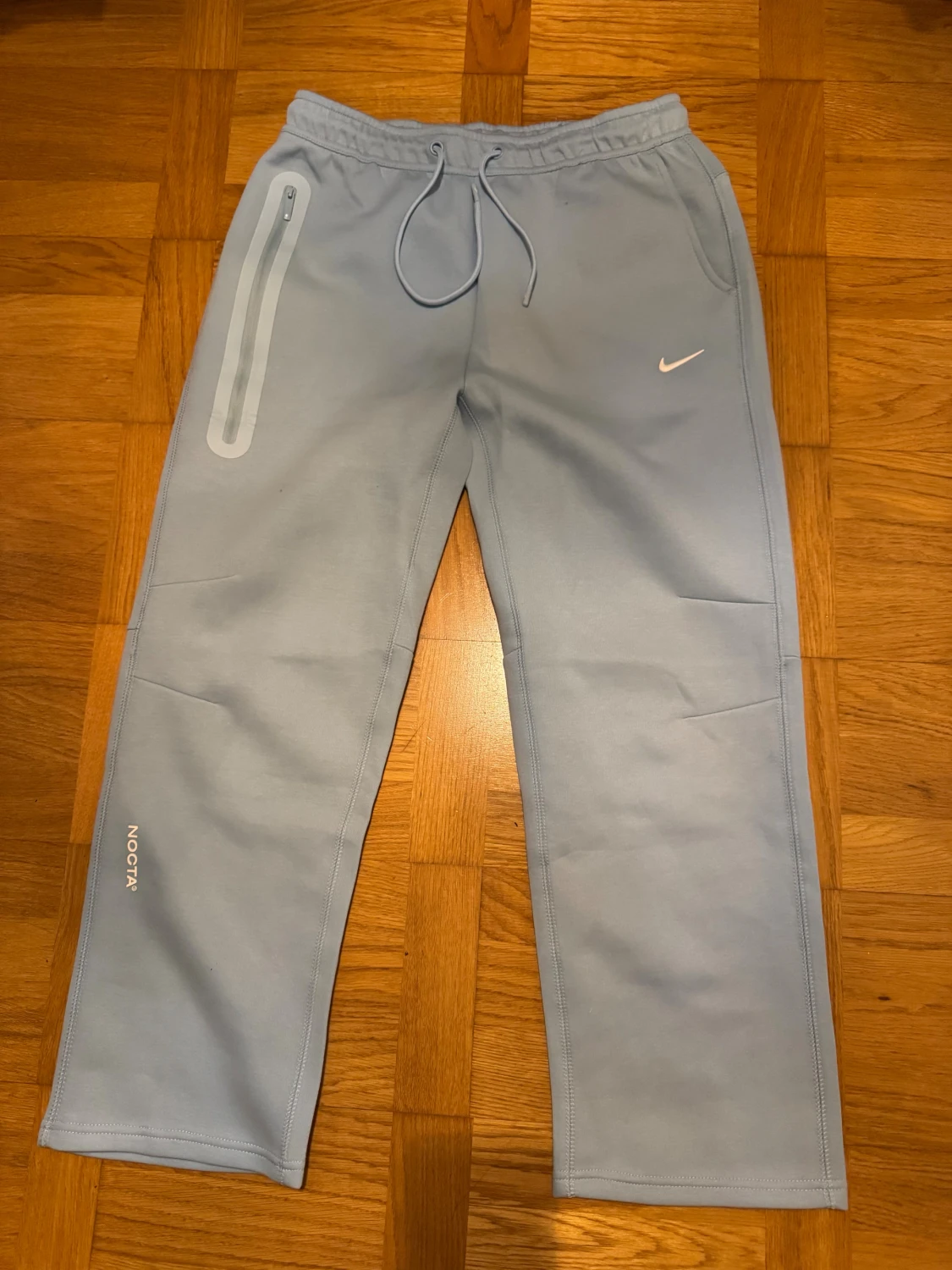 Nike NOCTA ljusblå mjukisbyxor - 1