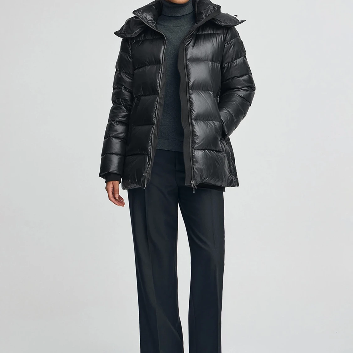 Svart pufferjacka med huva - 1