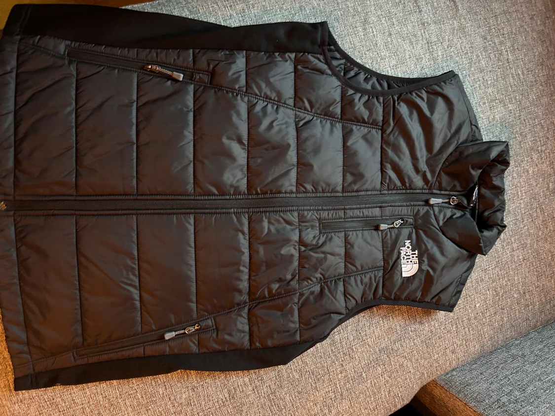 Svart dunväst från The North Face - 2