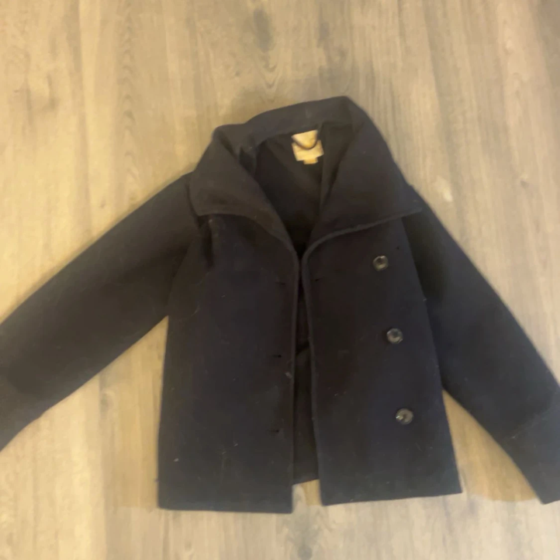 Svart skepparkavaj från Gina Tricot