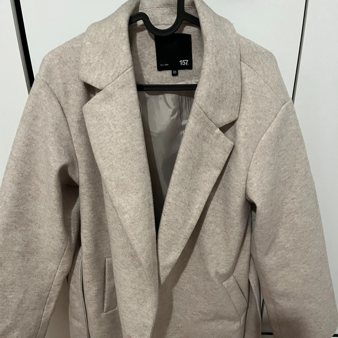 Beige kappa från 157 i ullmix XS