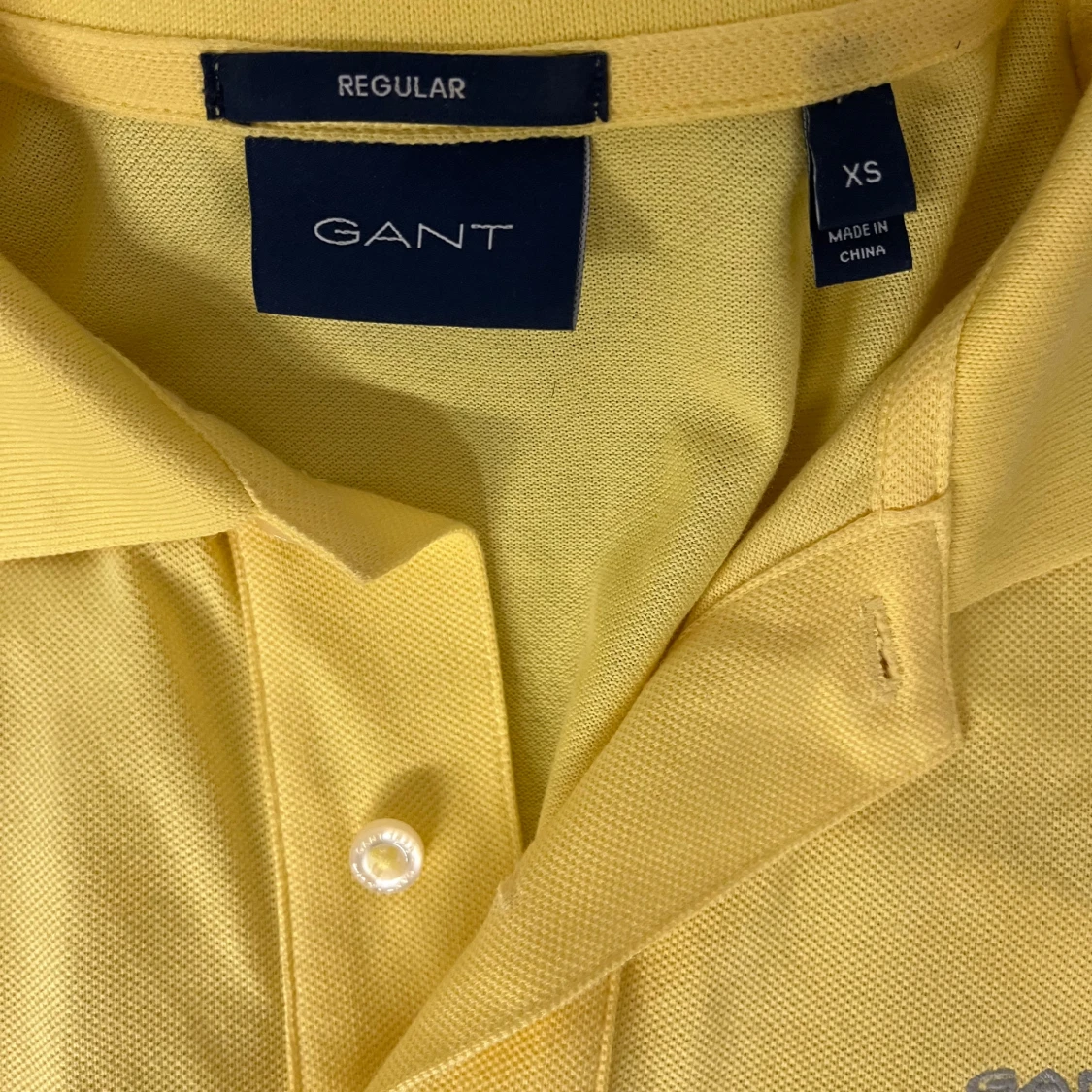 Gul pikétröja från GANT XS - 1
