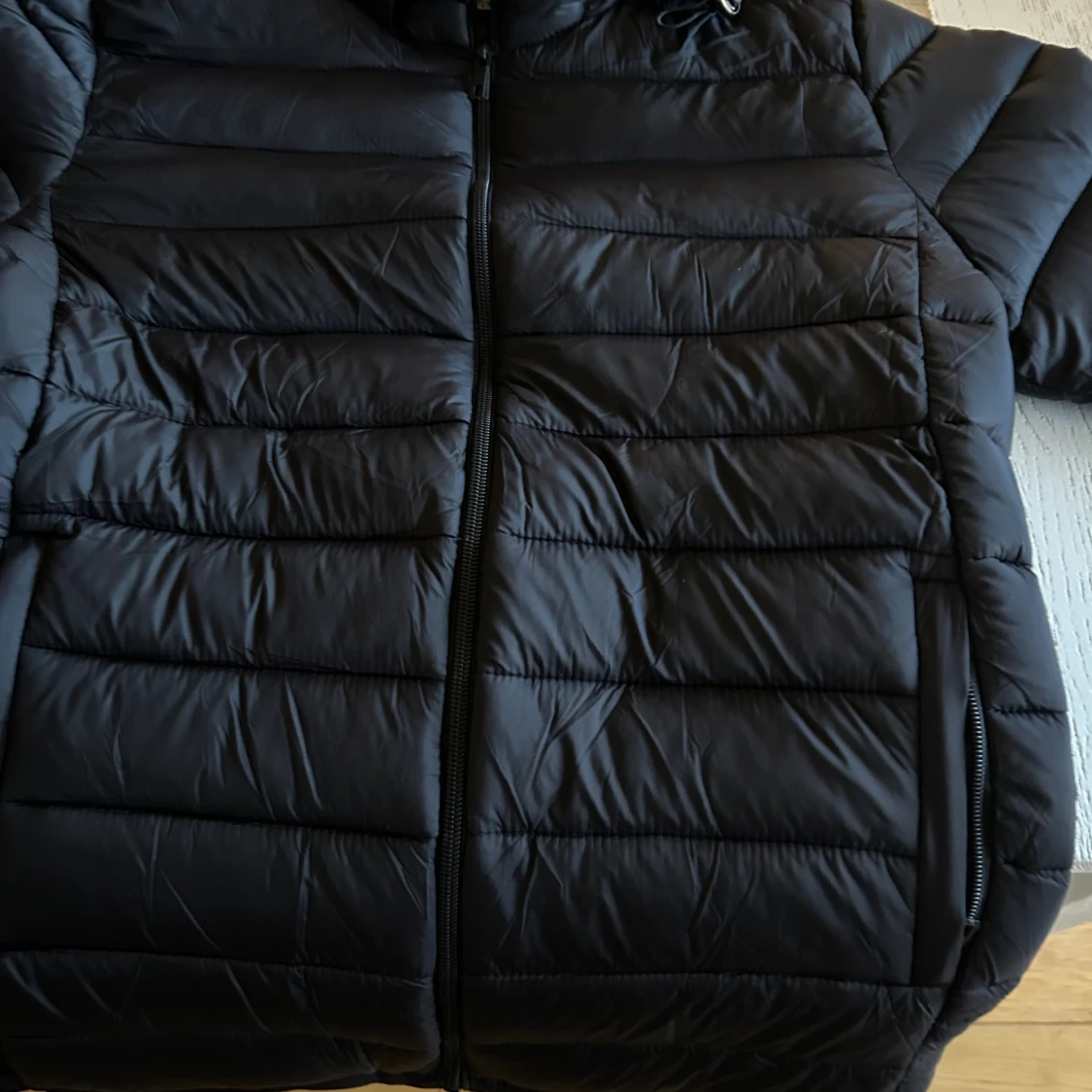 Svart pufferjacka från Stone Island - 1