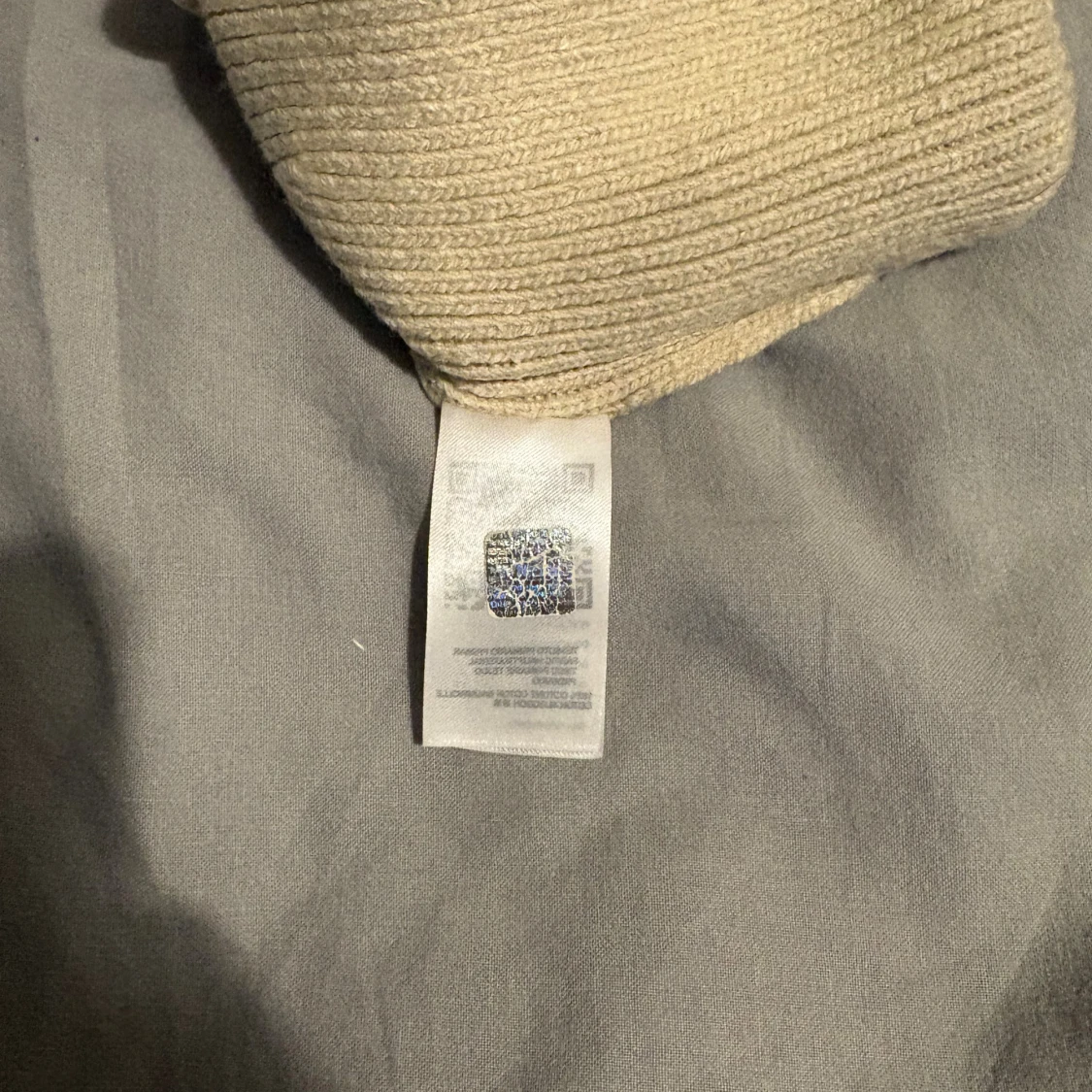 Beige mössa från The North Face - 1