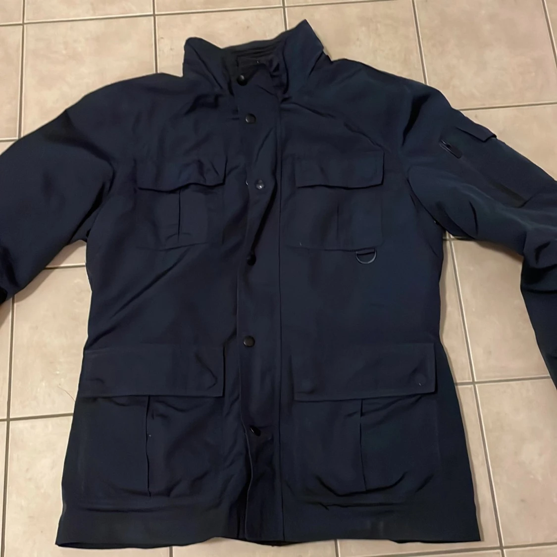 Mörkblå fieldjacket från Sfera Men