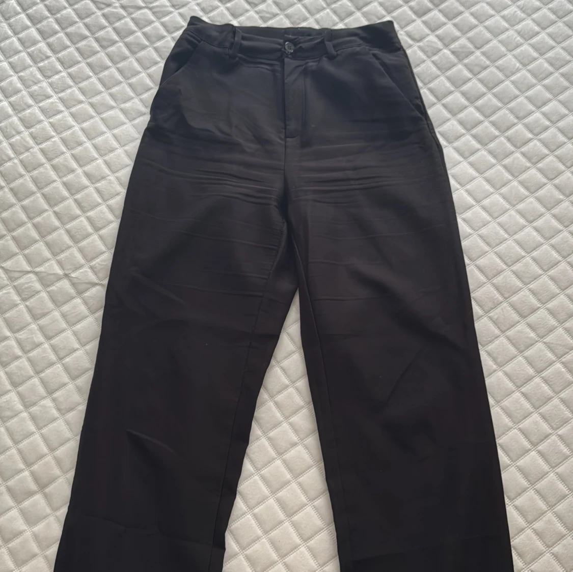 Högmidjade kostymbyxor