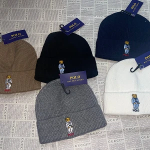 Ribbstickad mössa Polo Ralph Lauren - Polo mössa finns i flera färger,helt nya.Rabat vid köp av flera. One size 