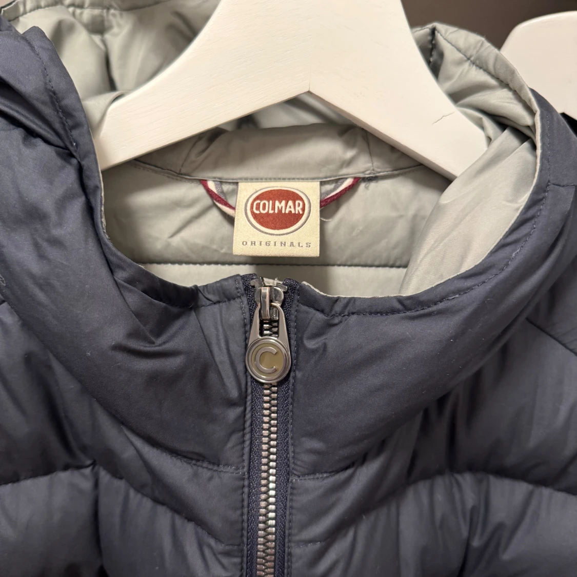 Mörkblå Colmar pufferjacka med huva - 1