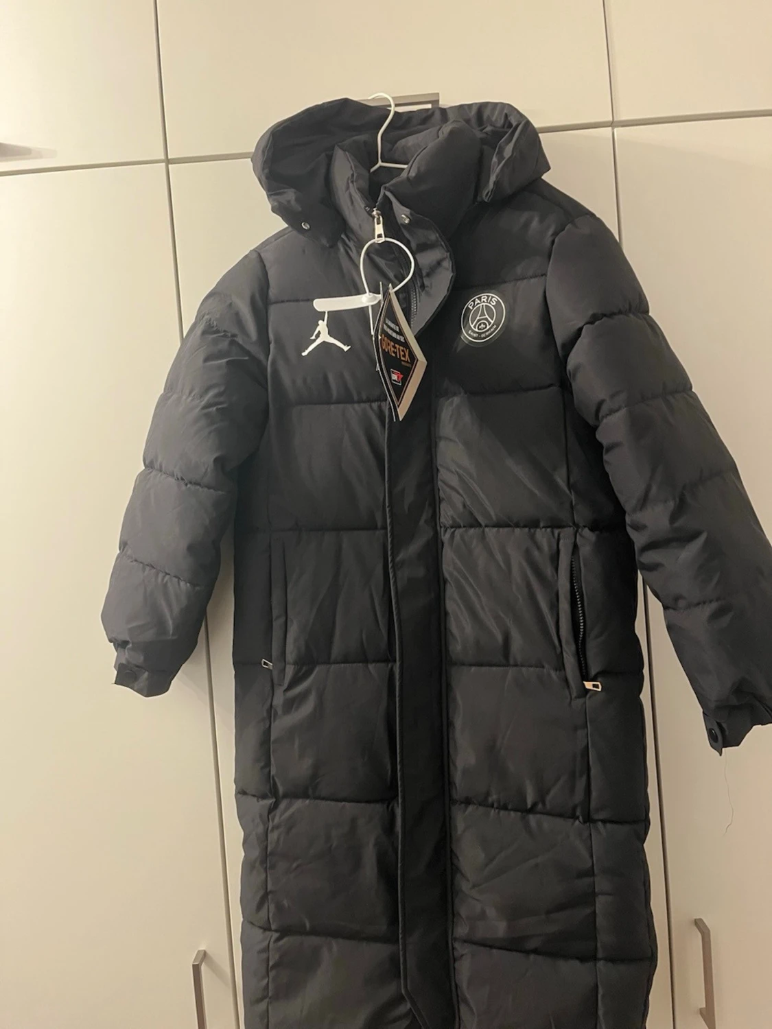 Svart lång dunjacka PSG x Jordan