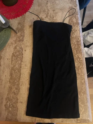 Svart kort klänning från Pull&Bear - Aldrig använd