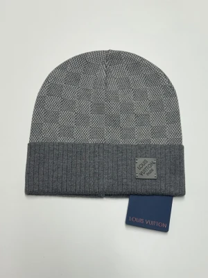 Lv Mössa - Helt ny aldrig använd. Storlek One size. Snabb frakt fraktar inom 24h.