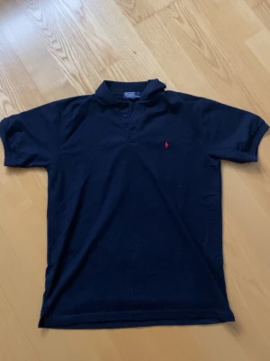 Ralph Lauren piké  - En Ralph Lauren piké (äkta) storlek XXL men sitter som Xl 