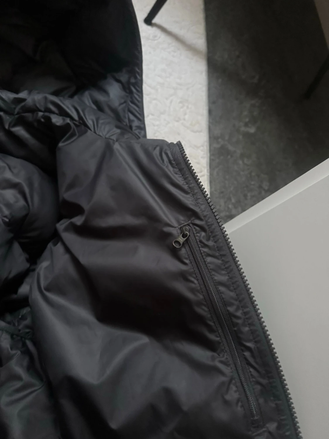 Svart lång pufferjacka från Nike - 2