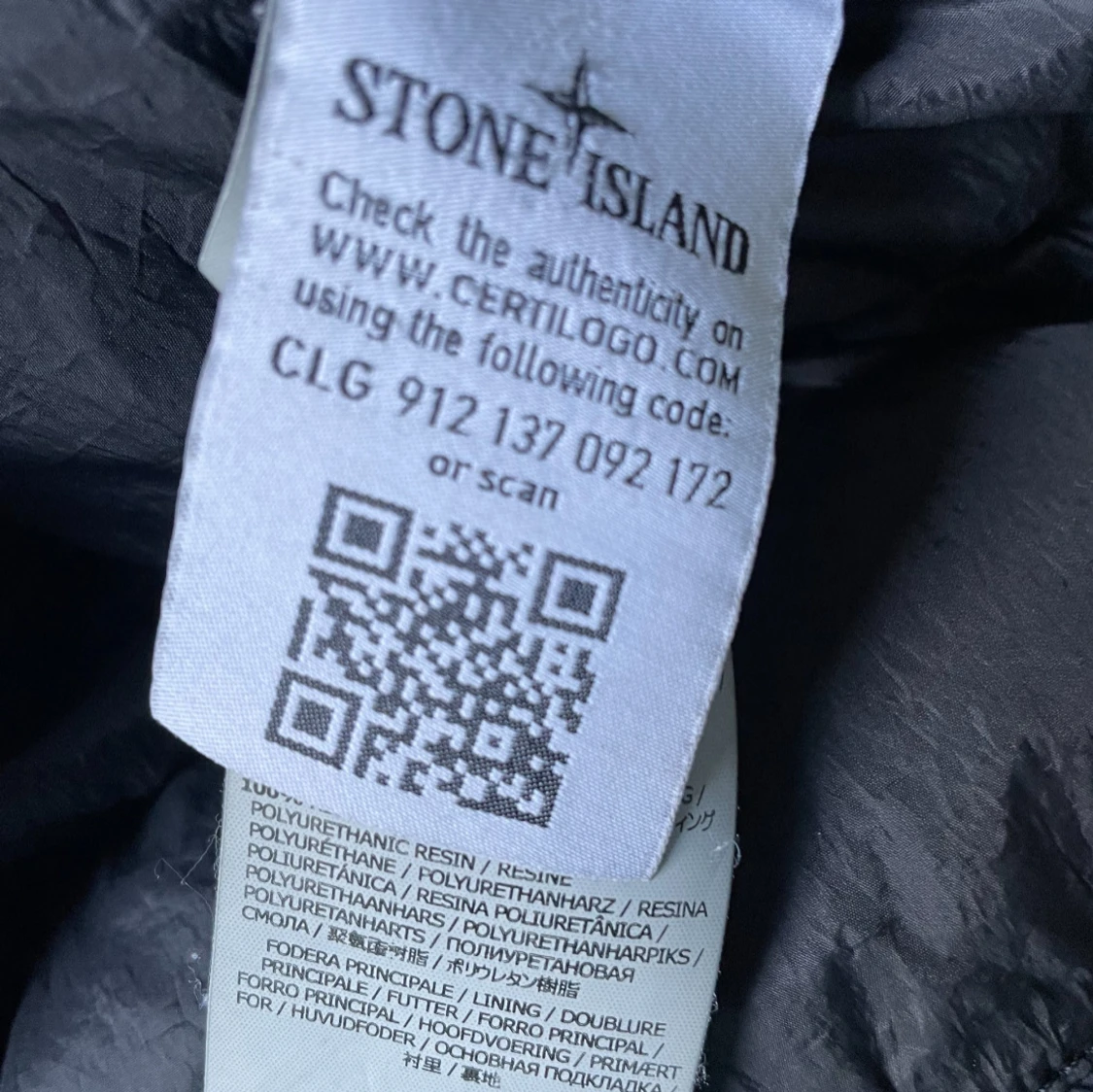 Mörkgrå pufferjacka från Stone Island - 4