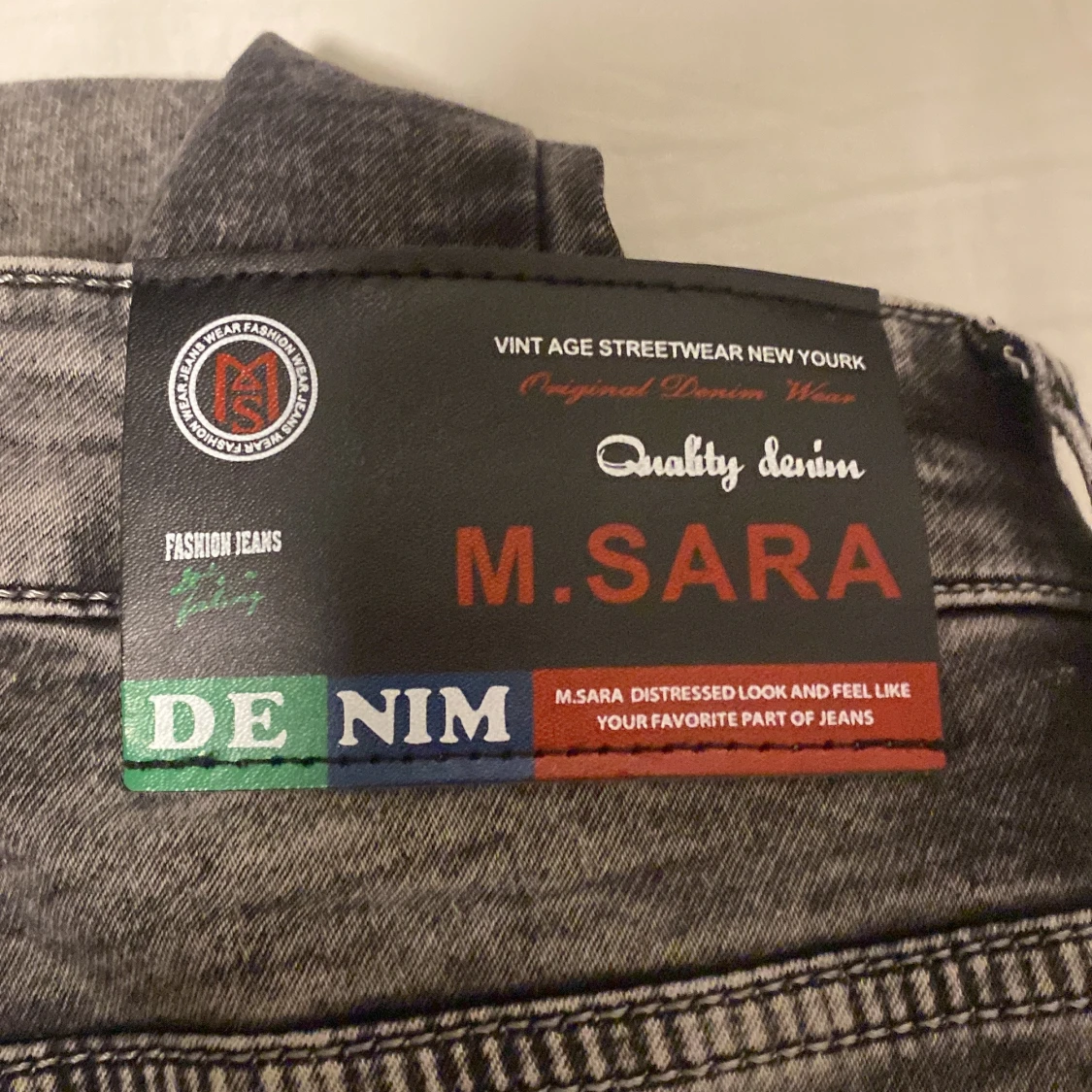 Grå tvättade jeans från M.Sara, strl 32 - 3