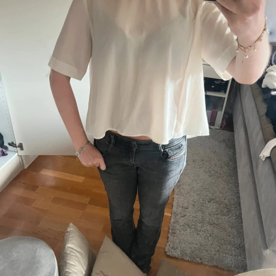 Vit blus med öppen rygg från H&M