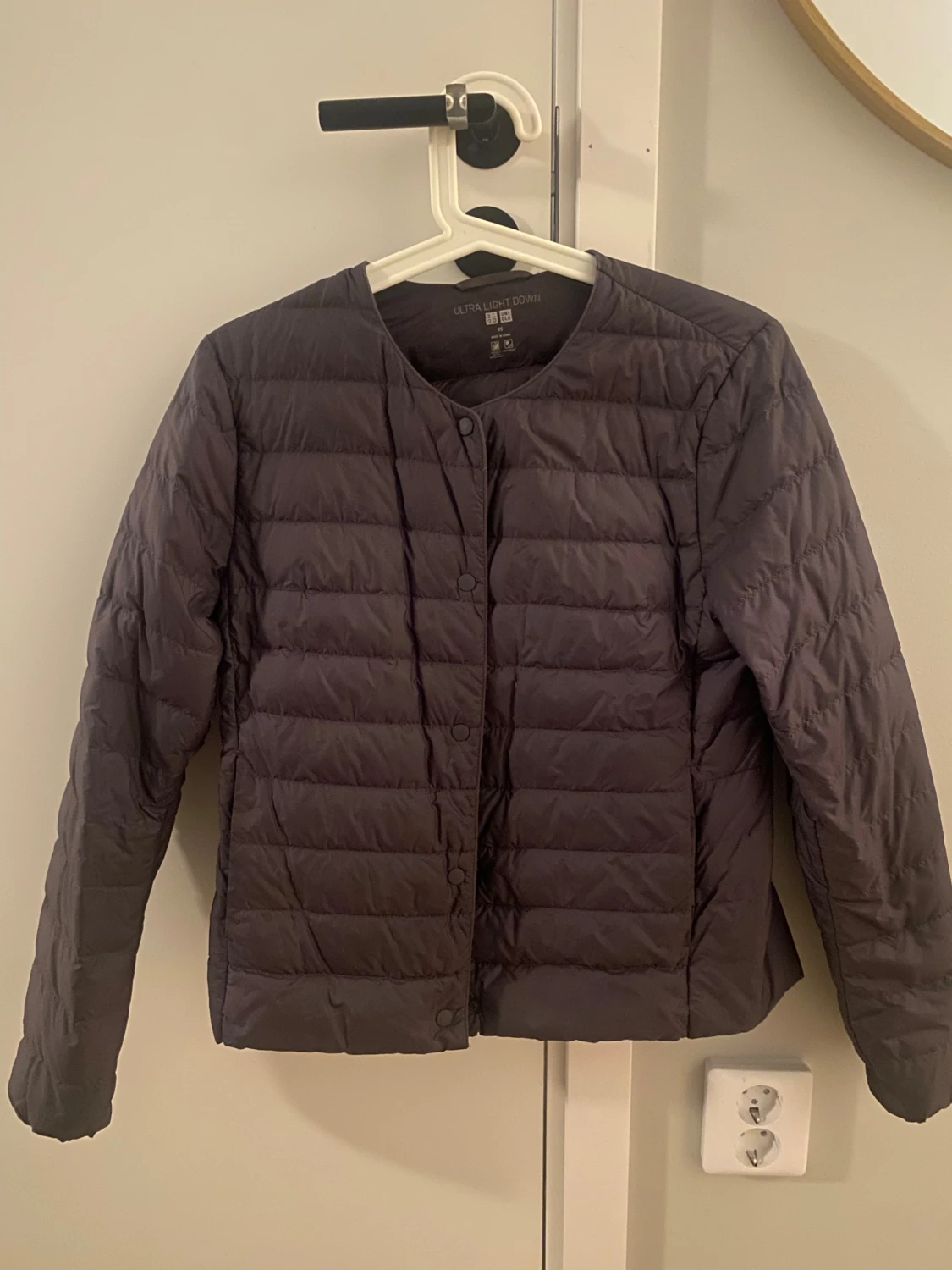 Grå dunjacka från Uniqlo XS - 1