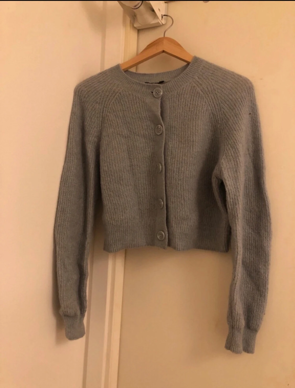 Ljusblå stickad kofta från Lindex