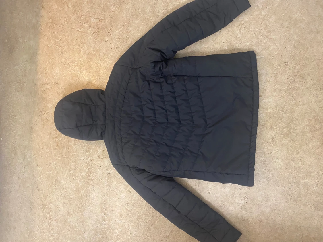 Svart pufferjacka Peak Performance - 1