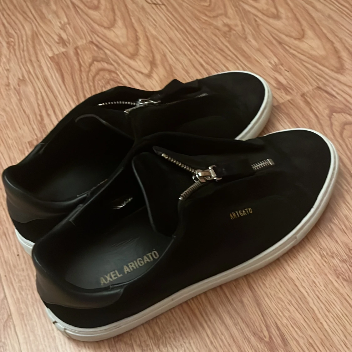 Axel arigato skor
