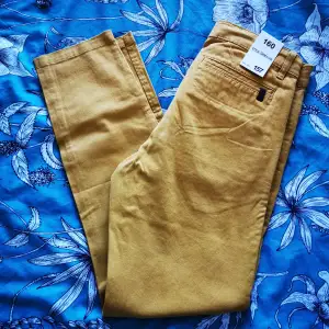 Chinos pants from Lager 157. Size 160cm but fits perfect a 36. New with tag 