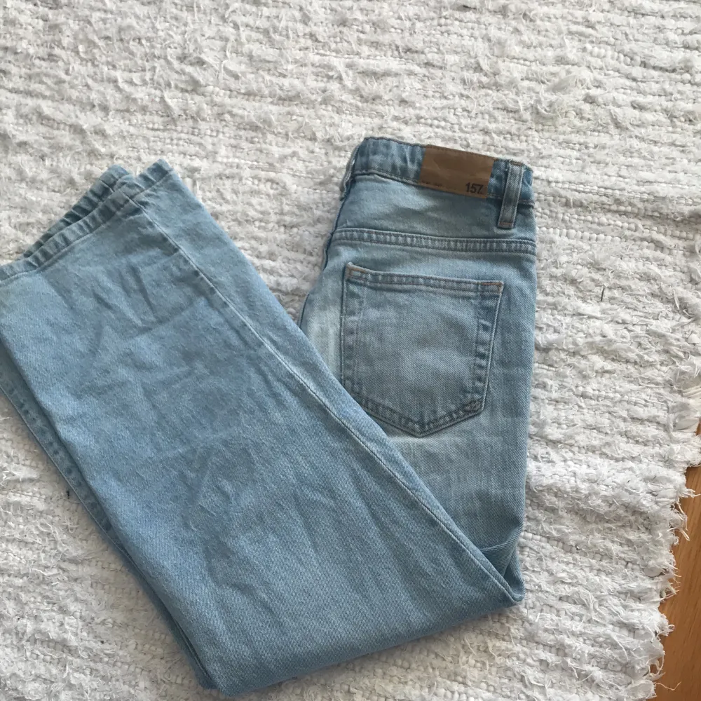 Vida, ljusblåa, högmidjade jeans från lager 157, barnstorlek 150. Andvända ett tag men bra skick.. Jeans & Byxor.