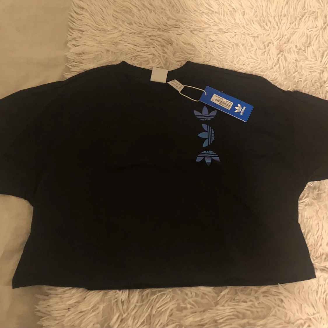 Skimrig adidas träningstopp