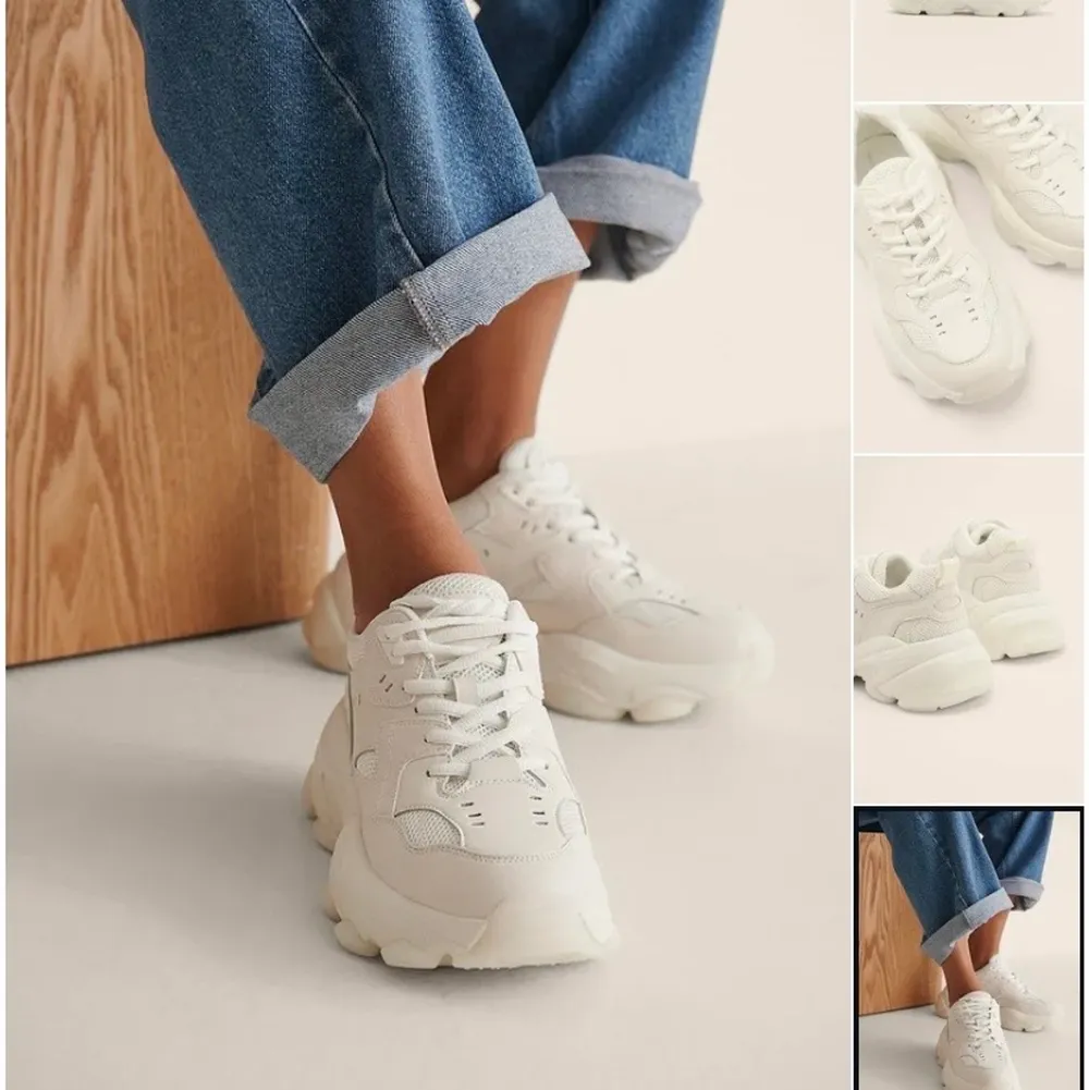Vita sneakers i storlek 39 från NA-KD. Måttligt använda men har lite smuts på insidan samt undersidan av skon (se bilder). Kan mest troligt tvättas bort.  Nypris 549:-. Skor.