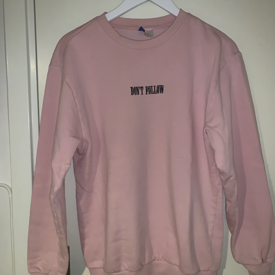 Ljus rosa sweatshirt