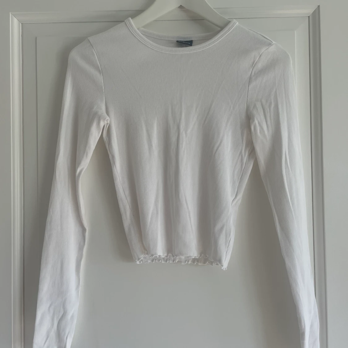 Långärmad tröja med öppen rygg