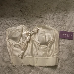 Korsett topp - Jätte söt korsett topp men kommer inte till användning då jag tycker att det är för lite stöd