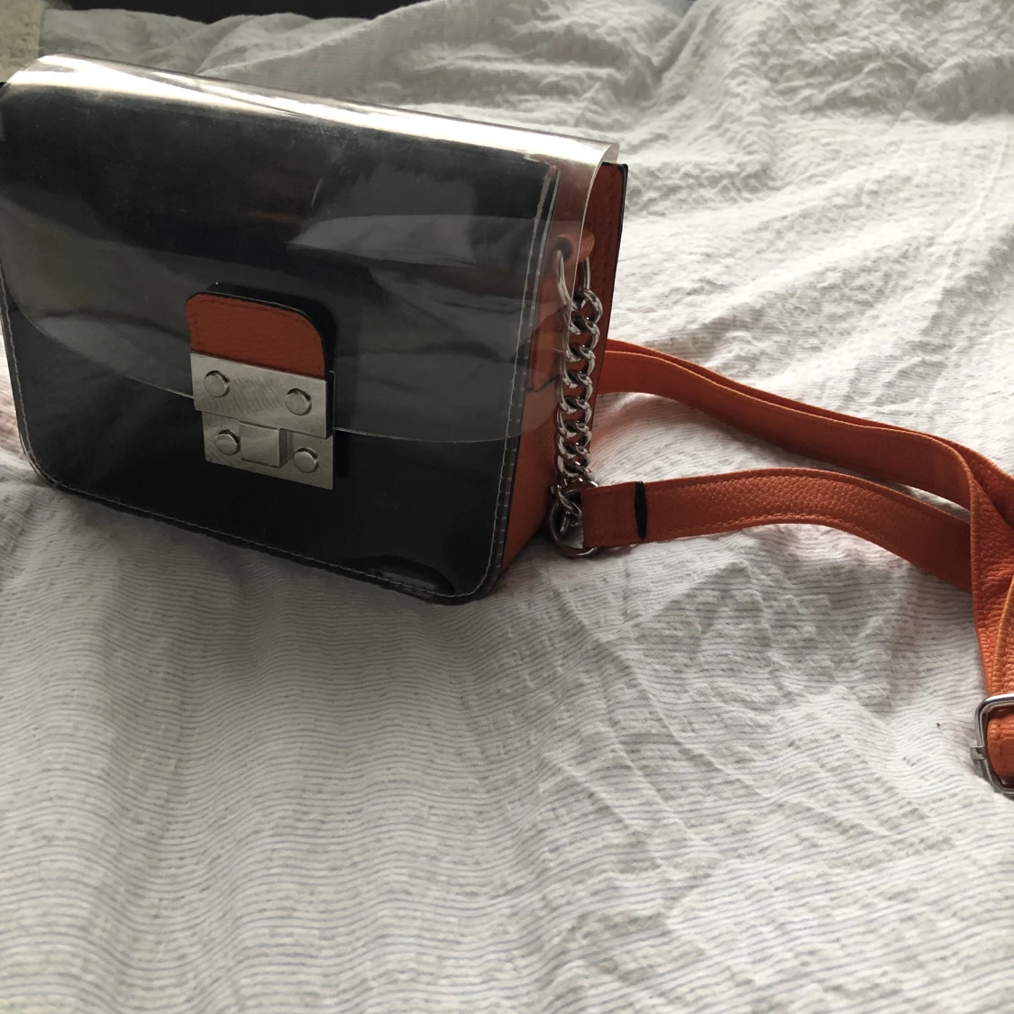 genomskinlig axelremsväska - 90