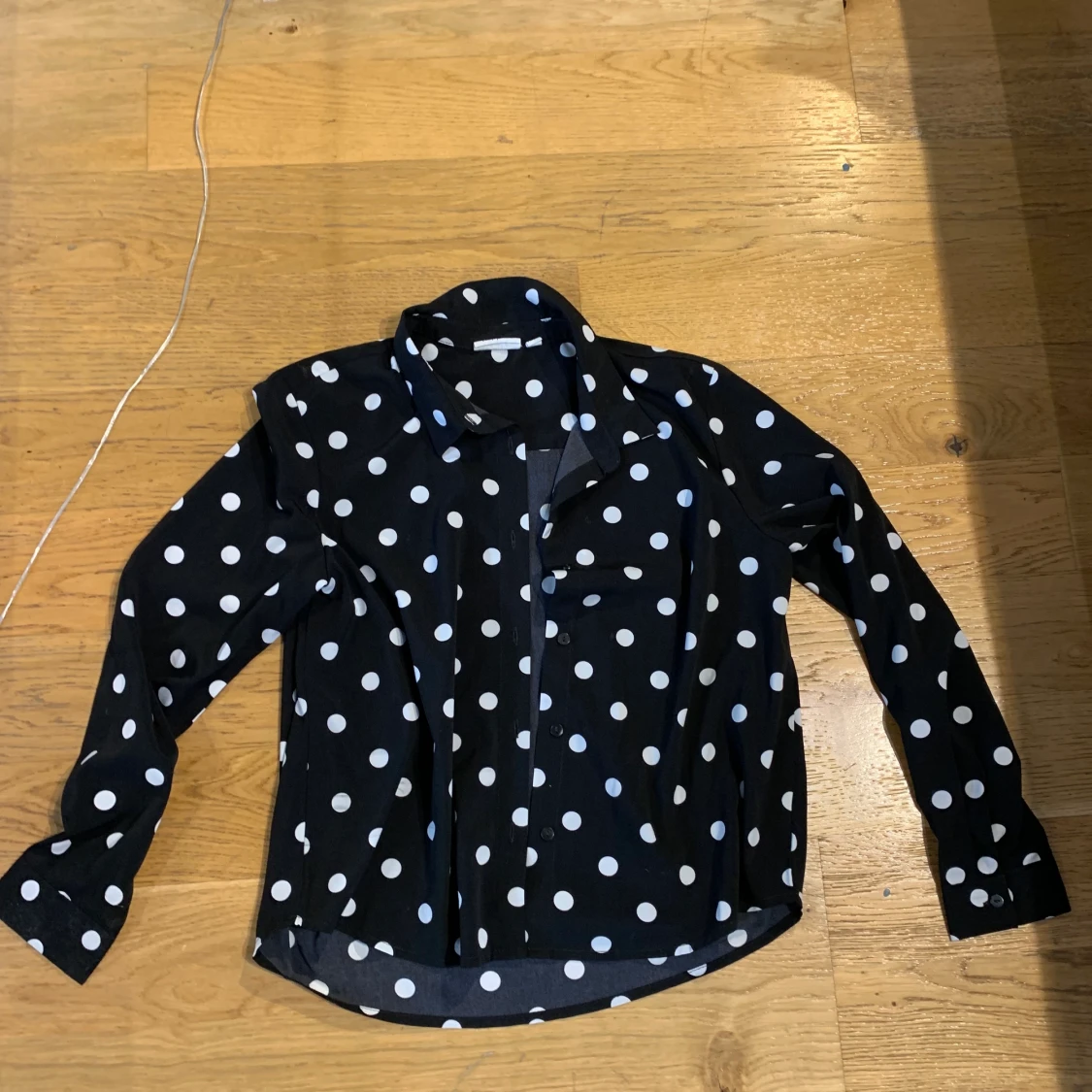 Prickig blus/skjorta storlek S