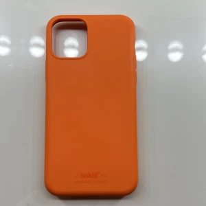 Holdit Mobilskal - Orange Holdit mobilskal för IPhone 11 PRO. Rätt använt med bara en liten skada (bild 2). Har du frågor så kan du bara skriva till mig☺️🫶🏼