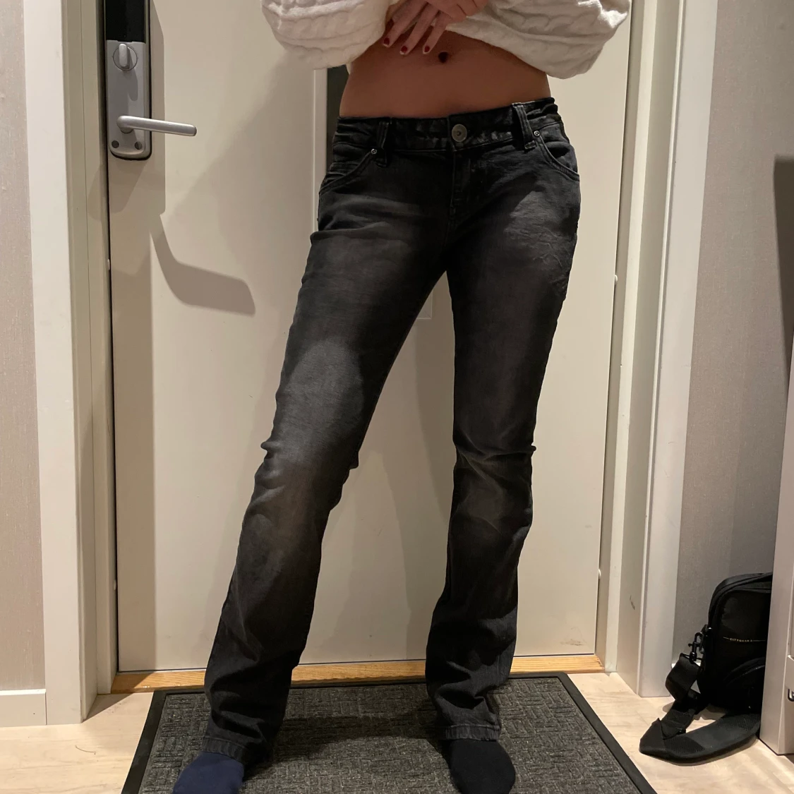 Svarta/går jenas med detaljer på rumpan