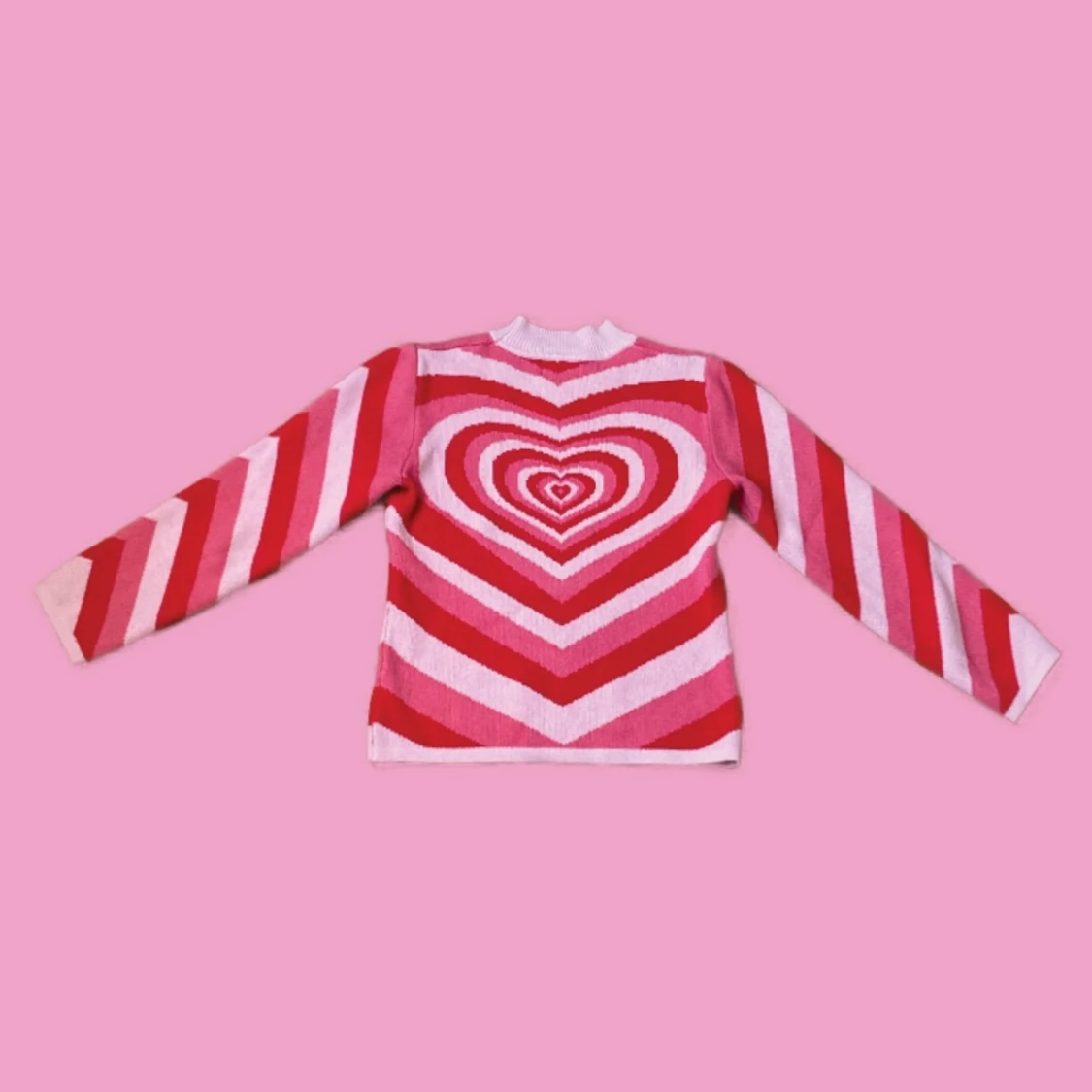 Rosa & röd stickad tröja