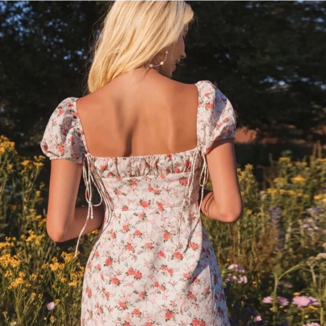 Blommig klänning - 91