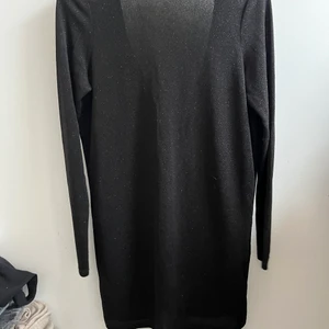 Dress - Dress with open back from ginatricot