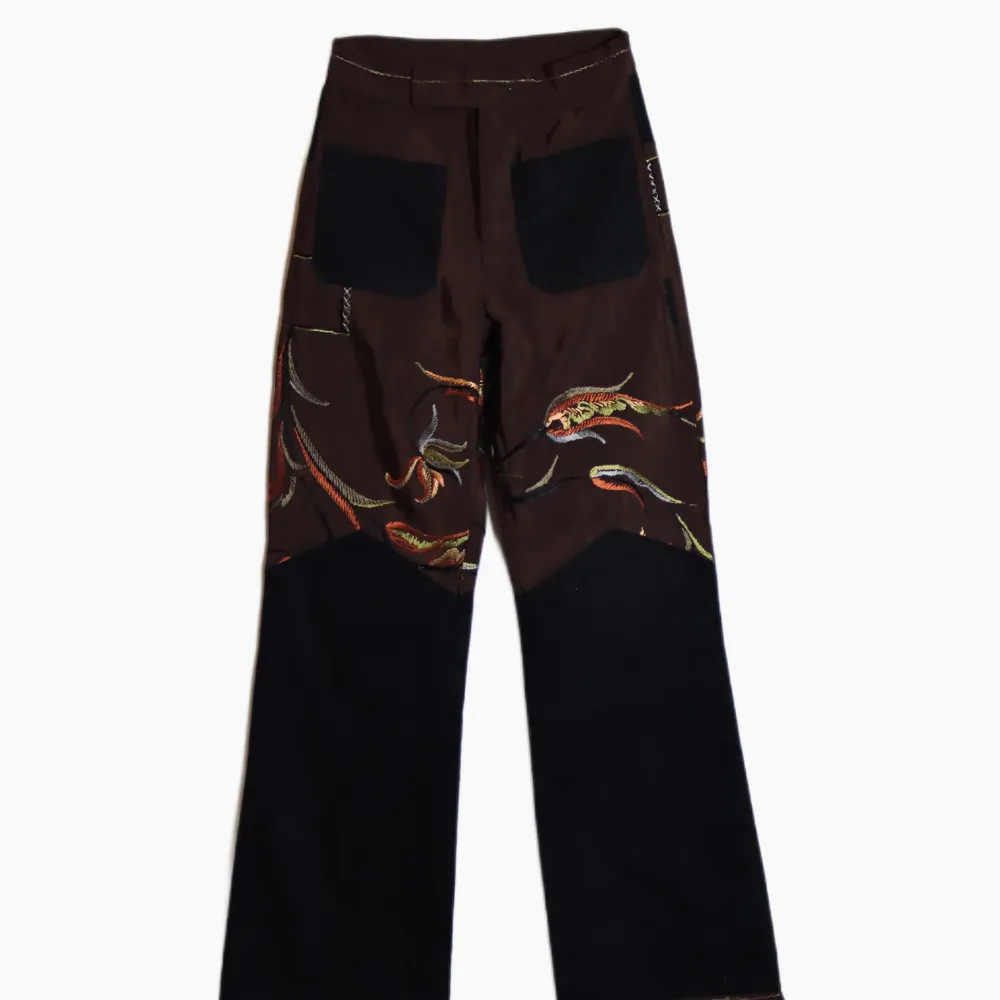 Embroidered Curtain high waist bootcut pants. Embroidered all over High waist. Inspired by 70s pants Tight fit at the top, 29 waist, 32 length. Jeans & Byxor.