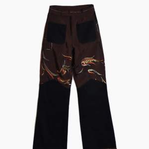 Embroidered Curtain high waist bootcut pants. Embroidered all over High waist. Inspired by 70s pants Tight fit at the top, 29 waist, 32 length