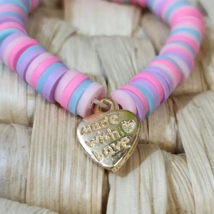 Bracelet  - The color  is pink light blue light pink  purple  its 15 DRH 