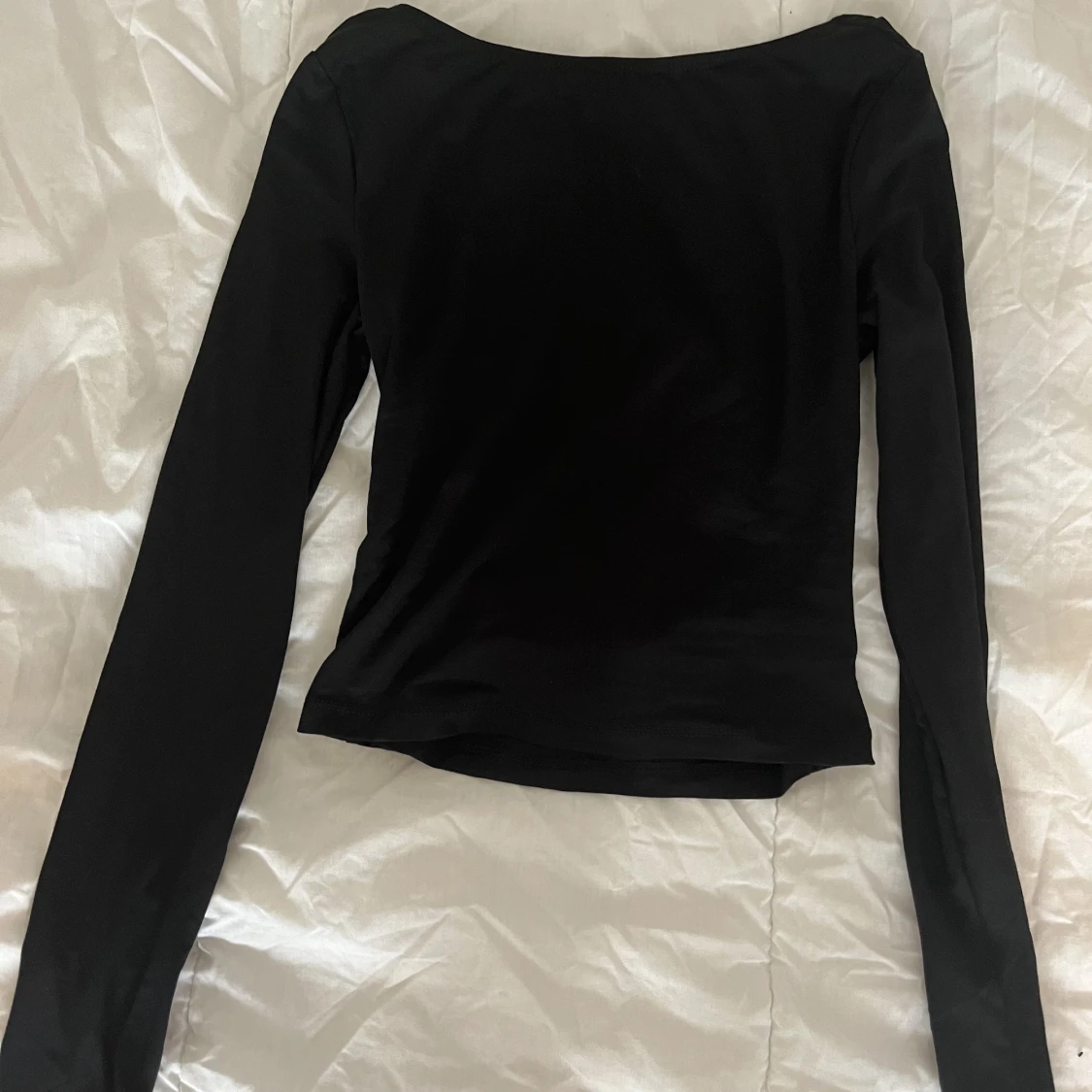 Svart tröja med öppen rygg - 90