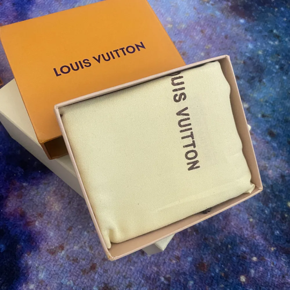 Louis Vuitton kopia , plånbok till herr, oanvänd . Väskor.