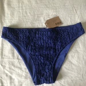 Blå bikiniunderdel  - Blå bikiniunderdel från Zalando. Aldrig använda. Prislappen sitter kvar. 