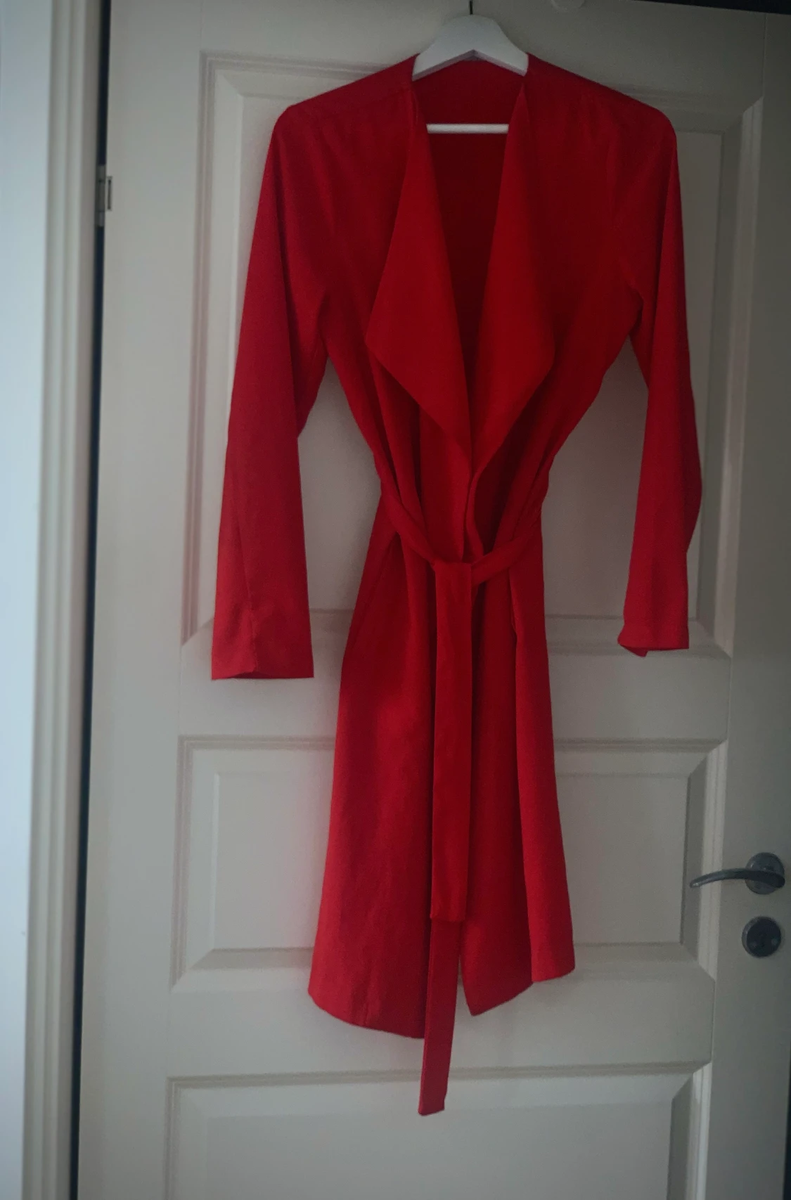 Röd tunnkappa, nyskick